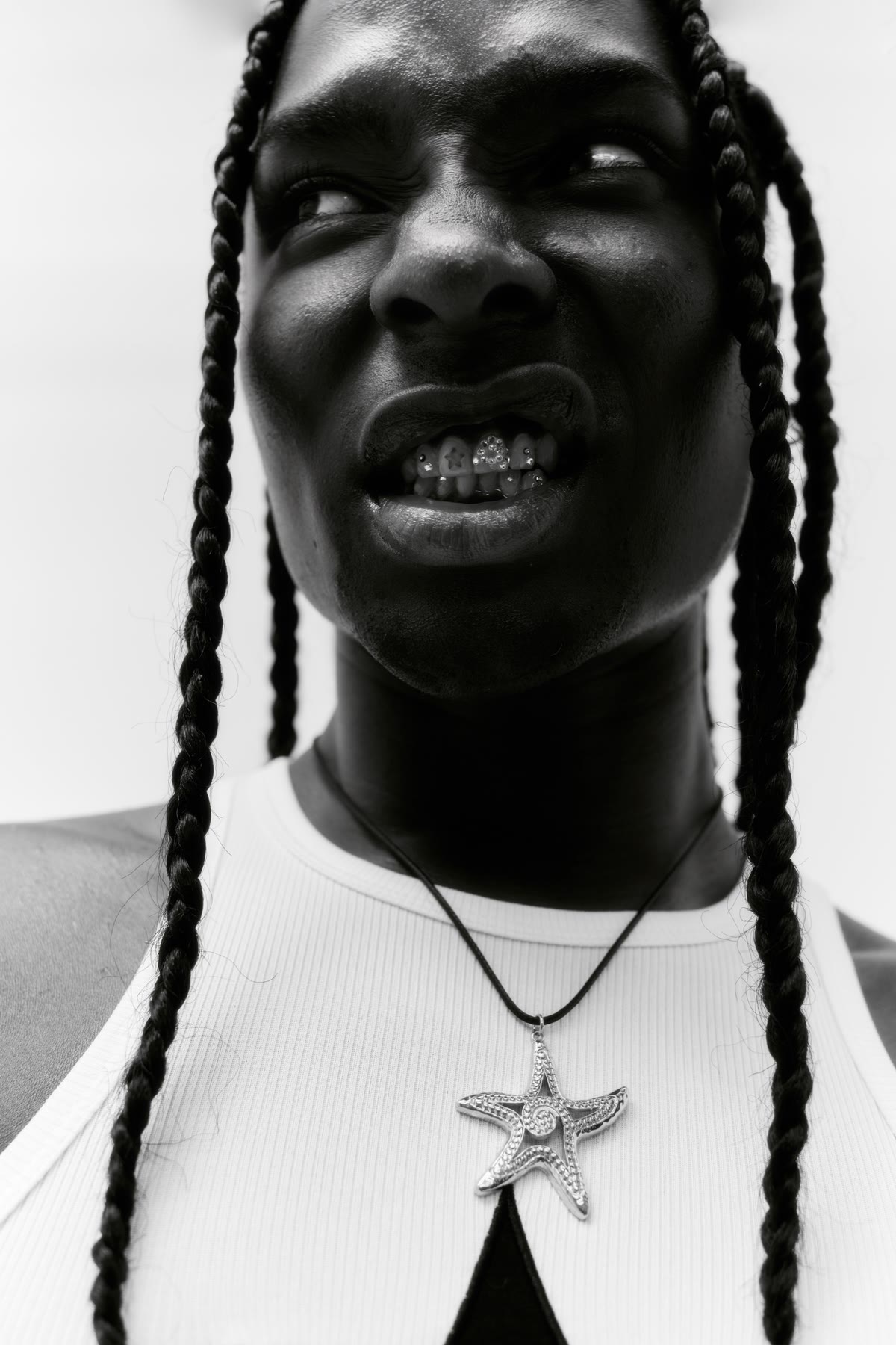 Black-and-white editorial portrait of Ryan Lovell